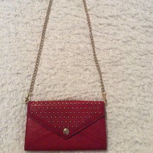 Rebecca Minkoff red studded wallet on a chain